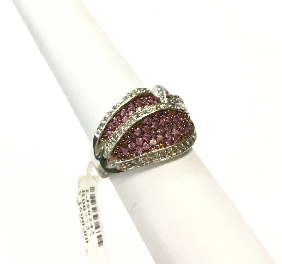14K WHITE GOLD RING, PINK SAPPHIRES, 0.50CTS DIAMONDS ( SIZE: 6.5 ) 9.2G: 14K WHITE GOLD RING WITH PINK SAPPHIRE AND DIAMONDS (SIZE:6.5) 14k White Gold Ring with Pink Sapphire and Diamonds You are bidding on a 14k White Gold Ring with Pink Sapphire and Diamonds. The ring ha