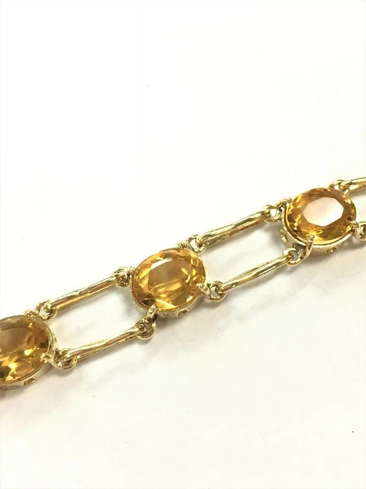VINTAGE 18K GOLD DOUBLE LINKED BRACELET, 11.9CTS OF CITRINE (6.5 INCH) 13 GRAMS: WOMEN'S 18K YELLOW GOLD BRACELET WITH GENUINE CITRINE 18k Yellow Gold Bracelet with Seven Genuine Citrine Stones You are bidding on a 18k Yellow Gold Bracelet with Seven Genuine Citrine Stones. Piece 