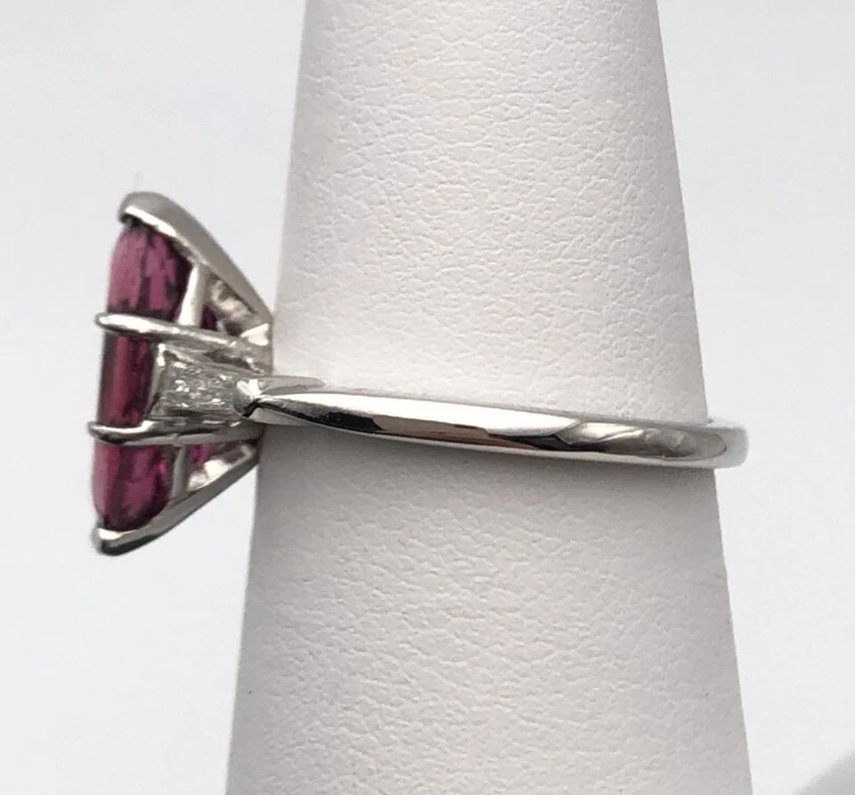PLATINUM RING, 2.27CT PINK TOURMALINE, 0.26CTS DIAMONDS ( SIZE: 6.25 ): PLATINUM RING WITH PINK TOURMALINE AND 0.26CTS DIAMONDS SIZE: 6.25 Platinum Ring with center Tourmaline and 0.26cts of side Diamonds Condition: Display Model, no box or papers Material: 900 Platinum R