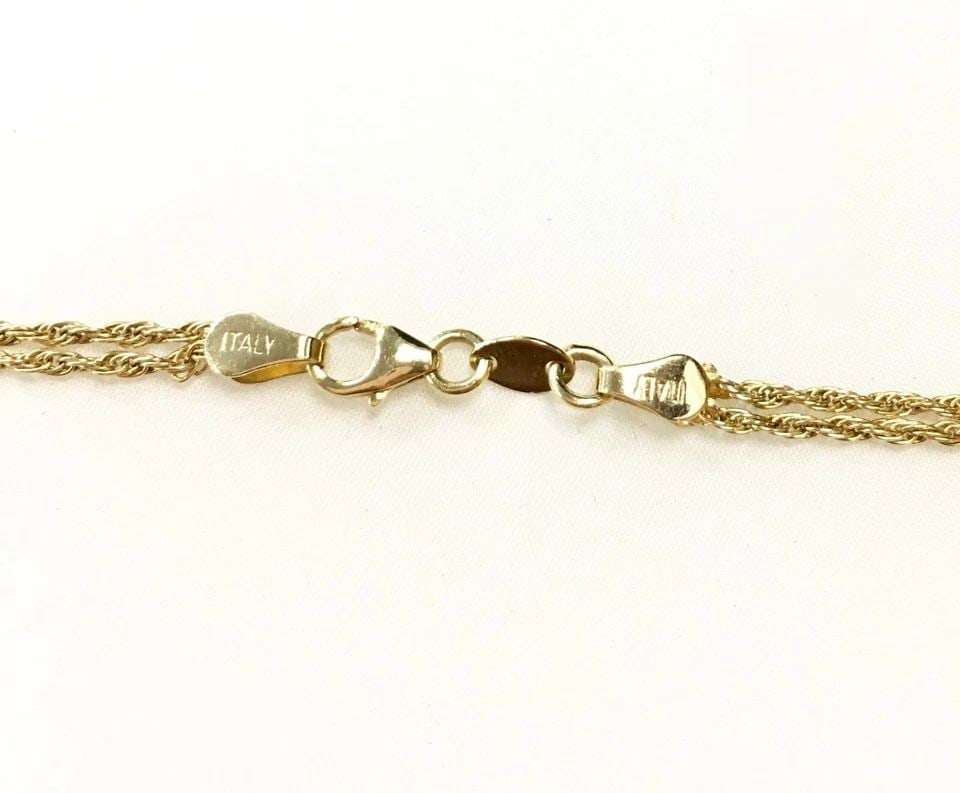 14K GOLD MILROS DOUBLE ROPE STYLE NECKLACE WITH CHARMS ( 18 INCH ) 8.9G: 14K YELLOW GOLD MILROS NECKLACE 14k Yellow Gold Milros Necklace You are bidding on a pre-owned 14k Yellow Gold Milros Necklace. There are few minor scratches on the necklace from normal wear and tear.