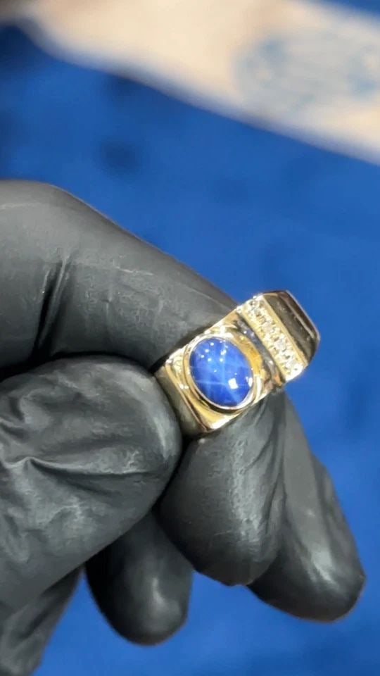 10K GOLD RING WITH LAB CREATED STAR SAPPHIRE, 0.04CTW DIAMONDS (SIZE 10) 9.2G: 10K GOLD RING WITH LAB CREATED STAR SAPPHIRE, AND 0.04CTS OF DIAMONDS SIZE: 10 10k Gold Ring with Lab Created Star Sapphire, and 0.04cts of Diamonds Condition: Used Material: 10k Yellow Gold Ring Size
