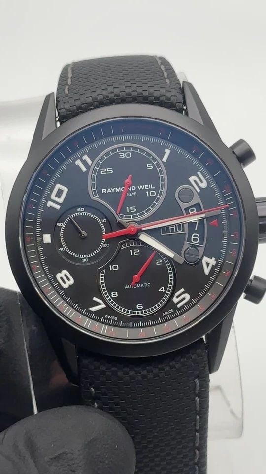 RAYMOND WEIL 7730-BK-05207 FREELANCER CHRONOGRAPH TACHYMETER AUTOMATIC WATCH: RAYMOND WEIL 7730-BK-05207 Freelancer Chronograph Tachymeter Automatic Watch Condition: New, comes with original tags, NO box, watch was a display model that was almost never touched, in great conditi