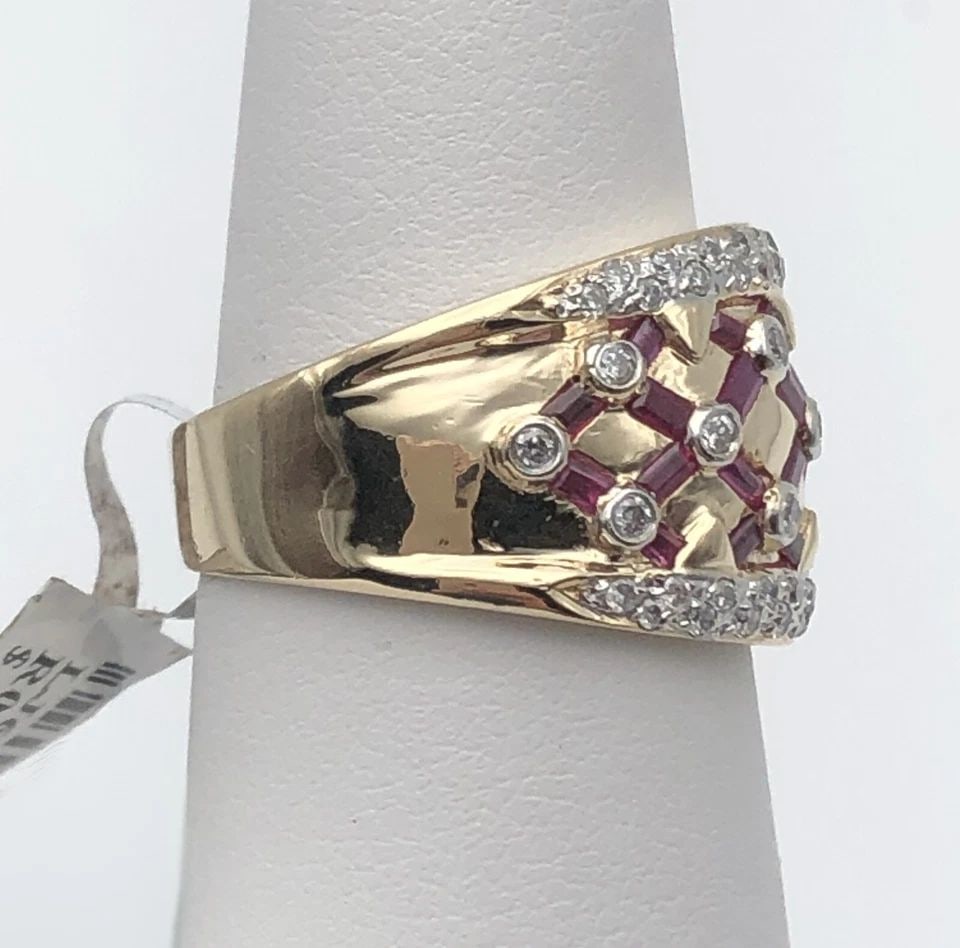 NEW 14K GOLD RING SET WITH 0.50CTS DIAMONDS AND 28 RUBIES (SIZE: 7.5) 7.3 GRAMS: 14K GOLD RING SET WITH 0.50CTS DIAMONDS AND 28 RUBIES SIZE: 7.5 14k Gold Ring set with 0.50ct of Diamonds as well as 28 Rubies You are bidding on a 14k Gold Ring set with 0.50ct of Diamonds as well as