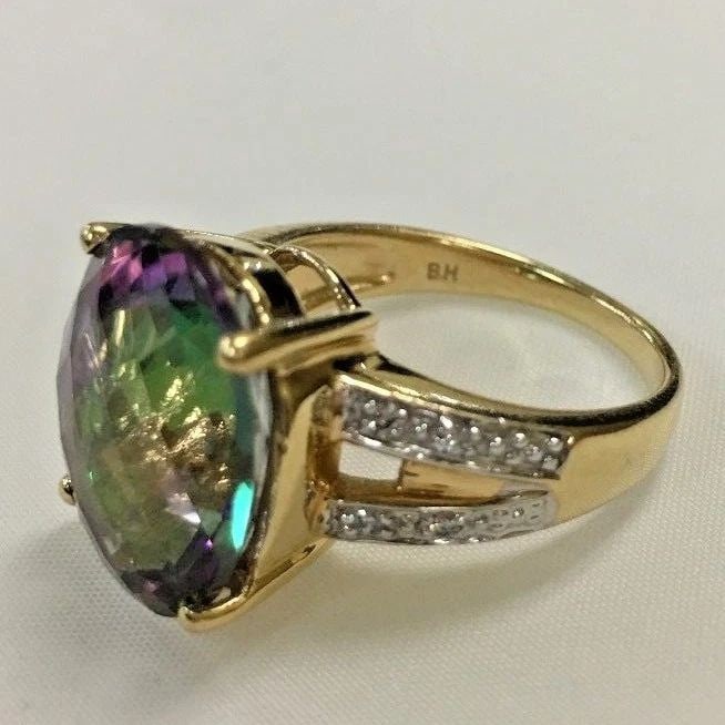 14K YELLOW GOLD WITH MYSTIC TOPAZ AND DIAMONDS (SIZE 7) 7.2 GRAMS: 14K YELLOW GOLD WITH MYSTIC TOPAZ AND DIAMONDS SIZE 7 14k Yellow Gold with Mystic Topaz and Diamonds size 7 You are bidding on a 14k Yellow Gold with Mystic Topaz and Diamonds. The ring is in excellen