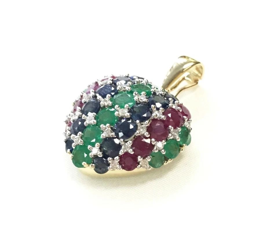 14K GOLD HEART PENDANT WITH DIAMONDS, EMERALDS, SAPPHIRE, AND RUBIES (5 GRAMS): 14K YELLOW GOLD HEART PENDANT WITH DIAMONDS, EMERALDS, SAPPHIRE, AND RUBIES 14k Yellow Gold Heart Pendant with Diamonds, Emeralds, Sapphire, and Rubies You are bidding on a 14k Yellow Gold Heart Penda