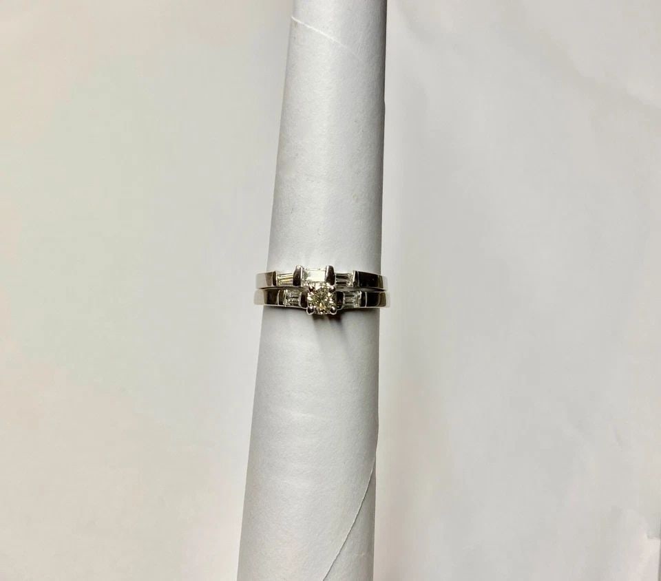 14K WHITE GOLD WEDDING SET WITH 0.65CT ROUND/BAGUETTE DIAMONDS (SIZE 6) 4G: WOMEN'S 14K WHITE GOLD WEDDING SET WITH 0.65CT ROUND/BAGUETTE DIAMONDS (SIZE 6) Women's 14k White Gold Wedding Set with 0.65ct Diamonds (Size 6) You are bidding on a pre-owned Women's 14k White Gold W