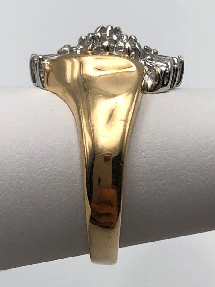 14K GOLD WOMAN'S CLUSTER STYLE RING WITH 0.53CTS OF DIAMONDS SIZE: 6.75 6.7G: 14K GOLD WOMAN'S CLUSTER STYLE RING SET WITH 0.53CTS OF DIAMONDS SIZE: 6.75 14k Gold Woman's cluster style Ring set with 0.53cts of Diamonds Condition: Used, has been cleaned Material: 14k Yellow Gold