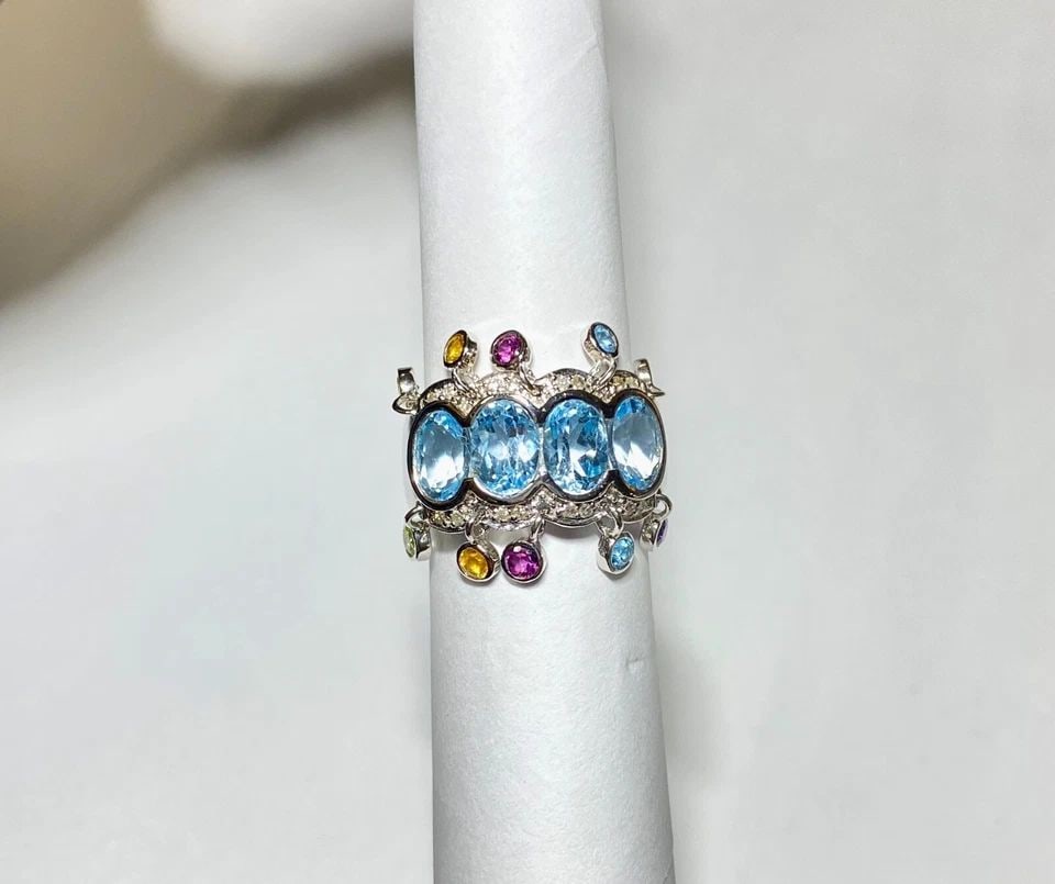 14K WHITE GOLD RING WITH BLUE TOPAZ AND 0.13CTS OF DIAMONDS SIZE: 7 7.6G: WOMEN'S 14K WHITE GOLD RING WITH BLUE TOPAZ AND 0.13CTS DIAMONDS (SIZE 7) Women's 14k White Gold Ring With Blue Topaz and 0.13CTS Diamonds (Size 7) You are bidding on a new with tags Women's 14k White