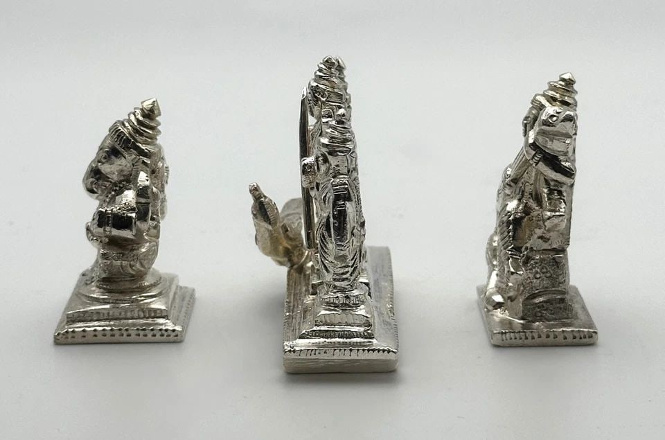 925 STERLING SILVER INDIAN IDOL / GODS STATUE FIGURES, SET OF THREE 195G TOTAL: 925 Sterling Silver Indian Idol / Gods Statue Figures, set of three Condition: Used Material: 925 Sterling Silver Size: Roughly 1.5 inches tall, 0.5 inches wide, with the widest one being 1.9 inches W