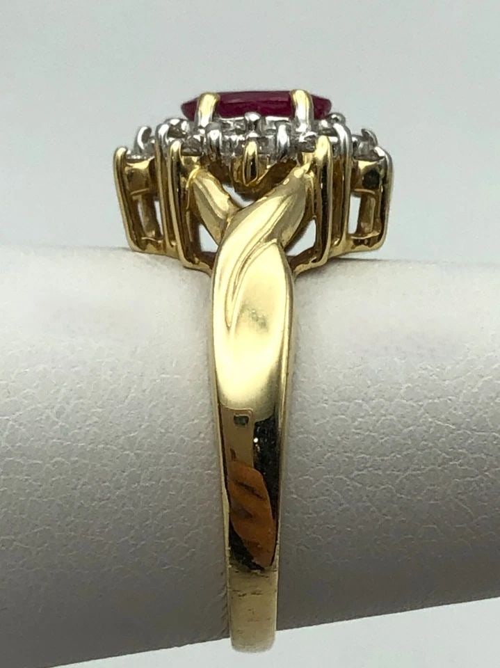 14K GOLD RING WITH NATURAL 1.0CT RUBY AND 0.20CTS DIAMONDS (SIZE: 6.75) 4.3 GRAM: 14K YELLOW GOLD RING WITH NATURAL RUBY AND 0.20CTS OF DIAMONDS SIZE: 6.75 14k Yellow Gold Ring with Natural Ruby and 0.20cts of Diamonds Condition: Used Material: 14k Yellow Gold Ring Size: 6.75 Weigh