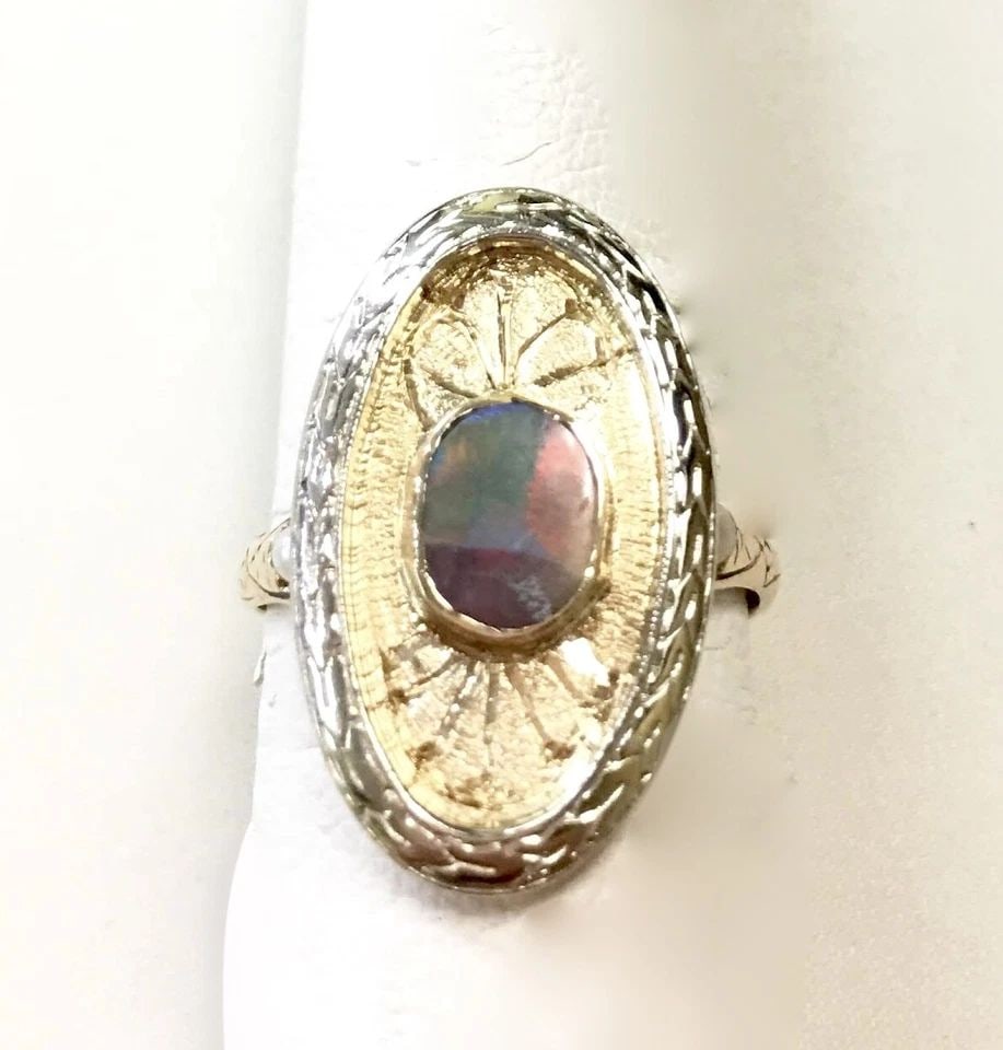 14K YELLOW/WHITE GOLD RING WITH NATURAL OPAL, CULTURED PEARLS (SIZE 7) 5.2 GRAMS: 14k Yellow/White Gold Ring with Opal stone You are bidding on a pre-owned 14k Yellow/White Gold Ring with Opal, pearls. There are few minor scratches on the ring from normal wear and tear. See picture