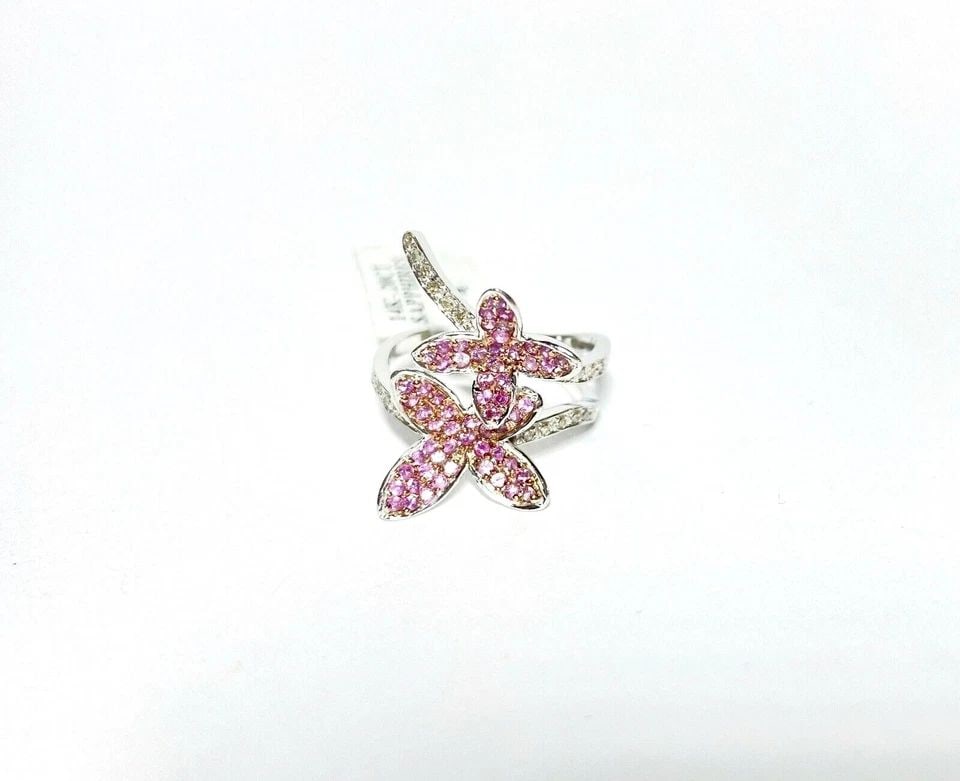 14K WHITE GOLD FLOWER RING WITH PINK SAPPHIRES, 0.20CTS DIAMONDS (SIZE 6.5) 4.8G: WOMEN'S 14K WHITE GOLD FLOWER RING WITH PINK SAPPHIRES AND 0.20CTS DIAMONDS Women's 14k White Gold Flower Ring with Pink Sapphires and 0.20CTS Diamonds You are bidding on a new with tags Women's 14k W