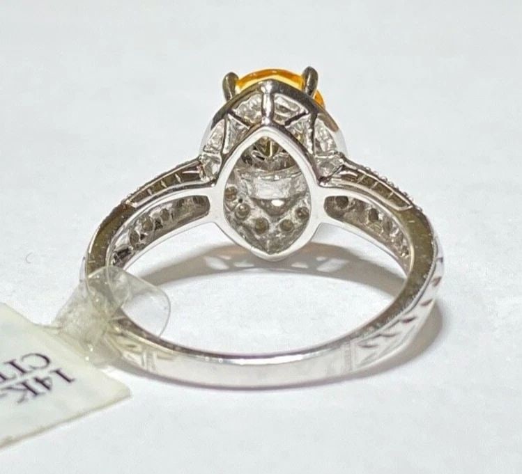 NEW 14K WHITE GOLD RING WITH CITRINE AND 0.27CTW DIAMONDS (SIZE 7) 5.1 GRAM: 14k White Gold Ring with Citrine and 0.27cts of Diamonds You are bidding on a new with tags Women's 14k White Gold Ring with Citrine and 0.27CTS Diamonds. The ring has minor scuffs and scratches from 
