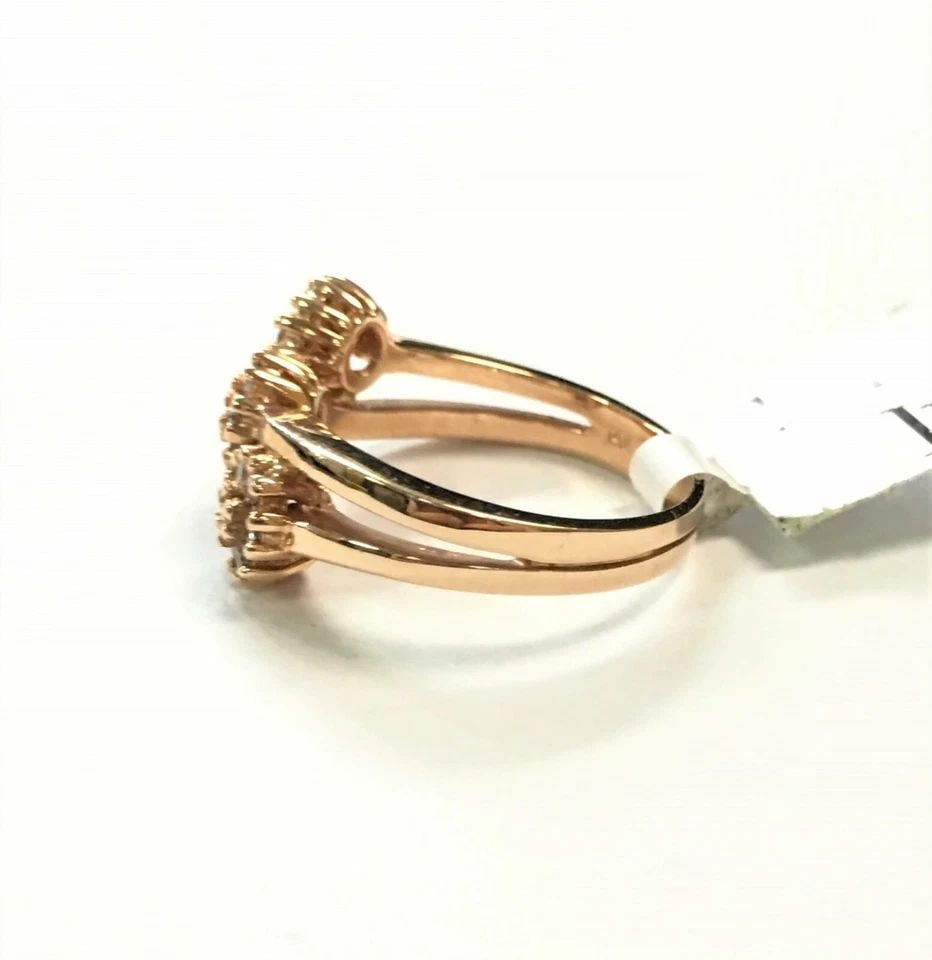NEW 14K ROSE GOLD RING, FLOWER CLUSTERS WITH 0.40CTW DIAMONDS (SIZE 7) 5 GRAM: 14k Rose Gold Ring Three Flower Clusters set with 0.40cts of Diamonds You are bidding on a 14k Rose Gold Ring Flower Style with Diamonds. The rings new with original tag but has some minor marks on it