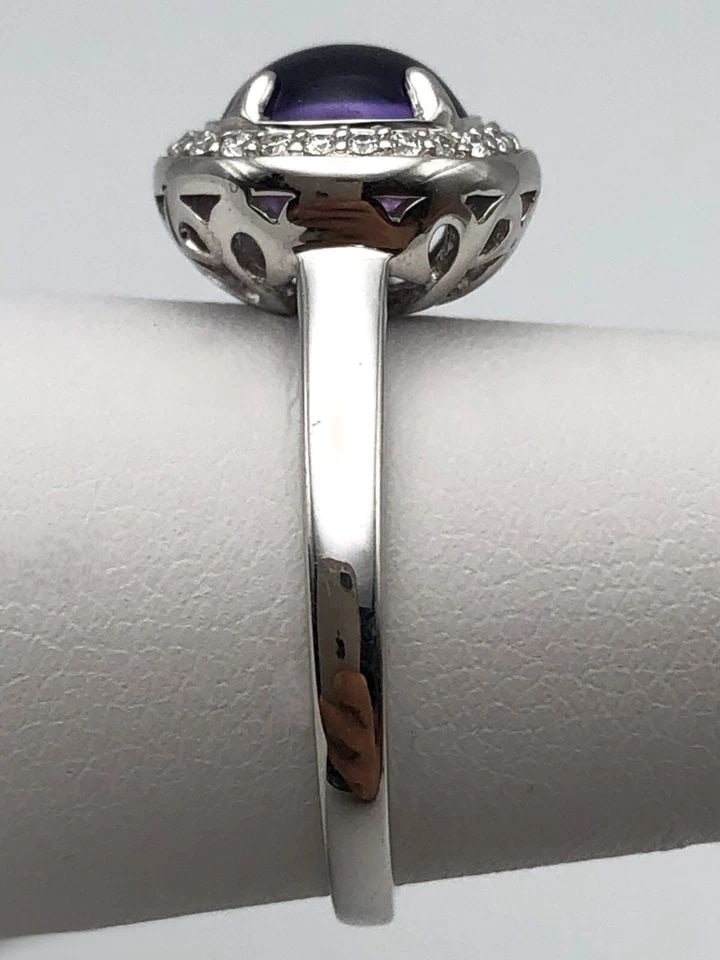14K WHITE GOLD RING SET WITH AMETHYST AND 0.25CTS OF DIAMONDS (SIZE: 7) 4.5GRAM: 14K WHITE GOLD RING SET WITH AMETHYST AND 0.25CTS OF DIAMONDS SIZE: 7 14k White Gold Ring set with Amethyst and 0.25cts of Diamonds Condition: Used, moved around in inventory Material: 14k White Gold 