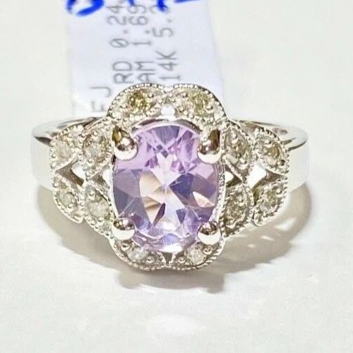NEW 14K WHITE GOLD RING WITH 1.69CT AMETHYST AND 0.24CTW DIAMONDS (SIZE 7) 5.3G: 14k White Gold Ring with 1.69ct Amethyst and 0.24cts of Diamonds You are bidding on a new with tags Women's 14k White Gold Ring with 1.69CTS Amethyst and 0.24CTS Diamonds. The ring has minor scuffs an