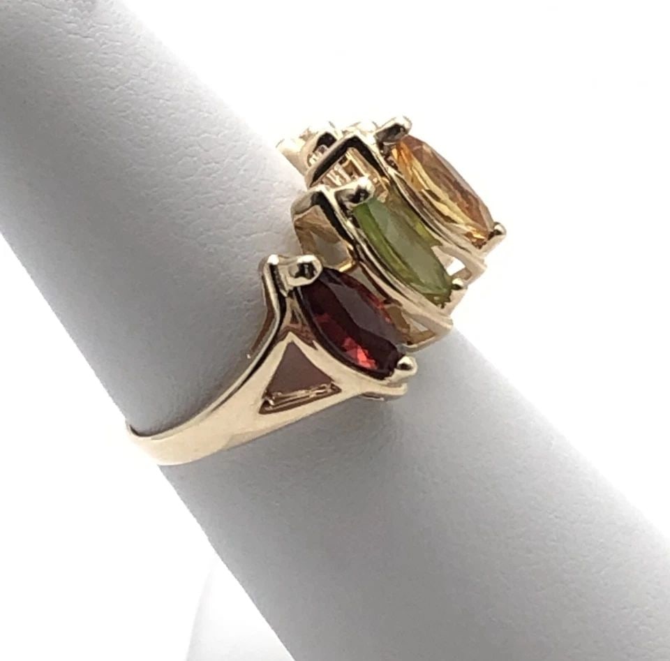 14K GOLD MOTHERS RING WITH AMETHYST, PERIDOT, CITRINE, BLUE TOPAZ, GARNET 3.6G: 14K GOLD MOTHERS RING SET WITH AMETHYST, PERIDOT, CITRINE, BLUE TOPAZ, GARNET 14k Gold Mothers Ring set with Amethyst, Peridot, Citrine, Blue Topaz, Garnet You are bidding on a 14k Gold Mothers Ring s