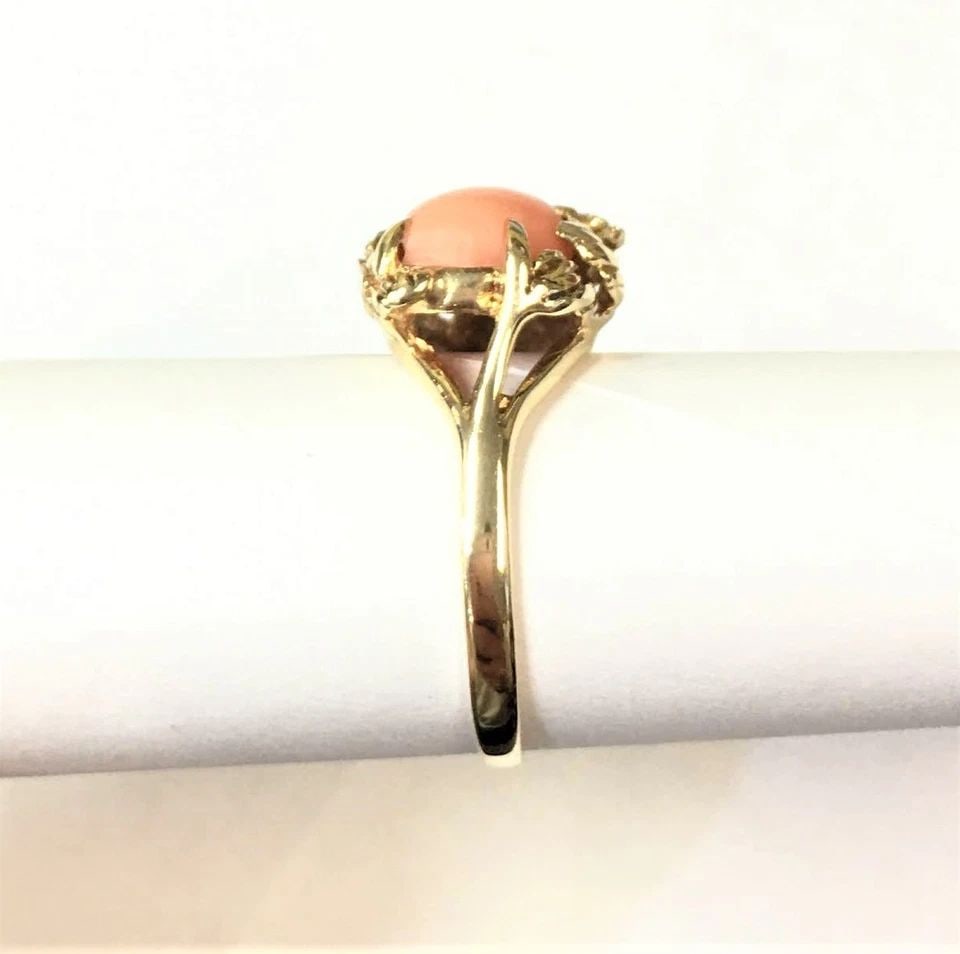 14K GOLD LEAFY STYLE RING WITH 9MM NATURAL CORAL ( SIZE: 8.75 ) 4.7 GRAMS: 14K YELLOW GOLD RING WITH CENTER CORAL STONE (SIZE: 8.75) 14k Yellow Gold Ring with center Coral Stone You are bidding on a 14k Yellow Gold Ring with center Coral Stone. The ring has been fully checke