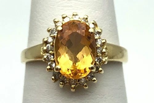 14K GOLD RING WITH HONEY TOPAZ, 0.20CTW DIAMONDS (SIZE: 6.5) 3G: 14K GOLD RING WITH HONEY TOPAZ, 0.20CTS OF DIAMONDS SIZE: 6.5 14k Gold Ring with Honey Topaz, 0.20cts of Diamonds Condition: Used Material: 14k Yellow Gold Ring Size: 6.5 Weight: 3.0 grams Top Width: 