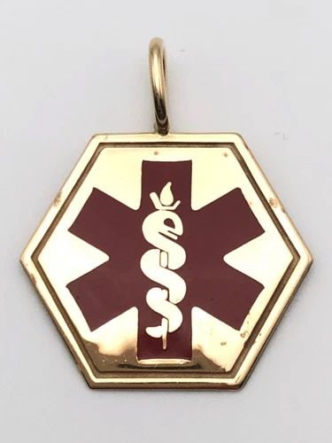 14K YELLOW GOLD MEDICAL ALERT OCTAGON PENDANT 3.3 GRAMS: 14K YELLOW GOLD MEDICAL ALERT OCTAGON PENDANT 3.3 GRAMS 14k Yellow Gold Medical Alert Octagon Pendant Condition: Used Material: 14k Yellow Gold Pendant Weight: 3.3 grams Pendant Size: 22mm tall not in