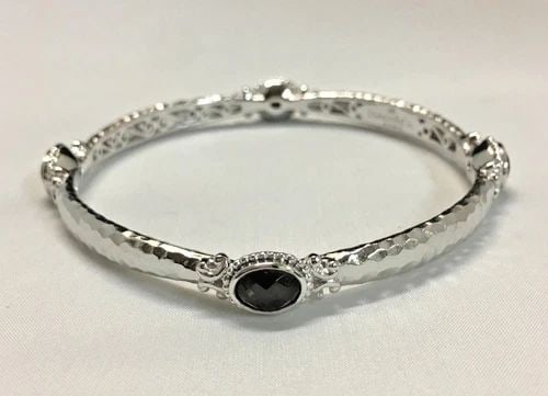 GABRIEL & CO BANGLE 925 SILVER, FOUR OVAL SMOKEY QUARTZ STONES (27.6 GRAMS): GABRIEL & CO BANGLE 925 STERLING SILVER, FOUR OVAL SMOKY QUARTZ Gabriel & Co bangle 925 sterling silver, four oval smoky quartz You are bidding on a new with defects Gabriel & Co bangle 925 sterling s