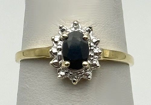 10K GOLD RING WITH NATURAL SAPPHIRE, 0.02CTW DIAMONDS (SIZE 7.5) 1.5 GRAM: 10K GOLD RING SET WITH NATURAL SAPPHIRE AND 0.02CTS OF DIAMONDS SIZE: 7.5 10k Gold Ring set with Sapphire and 0.02cts of Diamonds Condition: Used, has been cleaned Material: 10k Yellow Gold Ring Size: