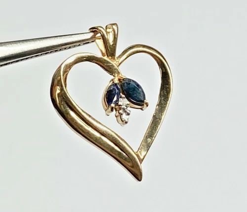 10K YELLOW GOLD HEART PENDANT, MARQUISE NATURAL SAPPHIRE, DIAMONDS 1.5 GRAM: 10K YELLOW GOLD HEART PENDANT WITH MARQUISE GENUINE SAPPHIRE AND DIAMONDS 10k Yellow Gold Heart Pendant with Marquise Genuine Sapphire and Diamonds You are bidding on a pre-owned 10k Yellow Gold Heart