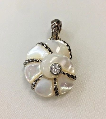 JUDITH RIPKA STERLING MOTHER OF PEARL DQCZ PENDANT: JUDITH RIPKA STERLING MOTHER OF PEARL DQCZ PENDANT Judith Ripka Sterling Mother of Pearl DQCZ Pendant You are bidding on a pre-owned Judith Ripka Sterling Mother of Pearl DQCZ Pendant. There are few m