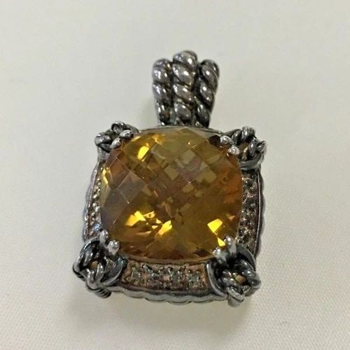 SJM STERLING SILVER CITRINE PENDANT: SJM STERLING SILVER CITRINE PENDANT SJM Sterling Citrine Pendant You are bidding on a pre-owned SJM Sterling Citrine Pendant. There are few minor scratches on the pendant from normal wear and tear, it
