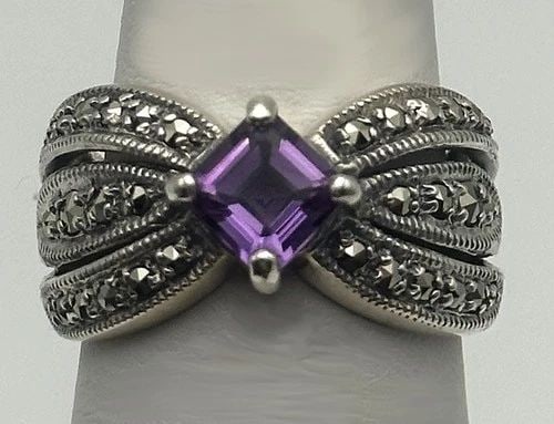 925 STERLING SILVER RING WITH AMETHYST AND MARCASITE (SIZE 7.25): 925 STERLING SILVER RING WITH AMETHYST AND MARCASITE'S SIZE: 7.25 925 Sterling Silver Ring with Amethyst and Marcasite's Condition: Used, has been cleaned and lightly polished by our in house Jewelers