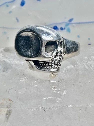 SKULL RING POISON BIKER BAND SIZE 9.25 STERLING SILVER WOMEN MEN: SKULL RING POISON BIKER BAND SIZE 9.25 STERLING SILVER WOMEN MEN Skull ring poison biker band size 9.25 sterling silver women men Size 9.25 Weight 9.5g Length. 5/8" Width 5/8" Thinnest part of band 5/