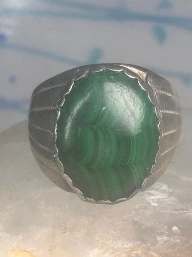 NAVAJO RING MALACHITE HEAVY BAND SIZE 9.75 STERLING SILVER: NAVAJO RING MALACHITE HEAVY BAND SIZE 9.75 STERLING SILVER Navajo ring Malachite heavy band size 9.75 sterling silver SIze 9.7 Weight 16g Length 7/8" Width 9/16" Thinnest part of band 7/32"