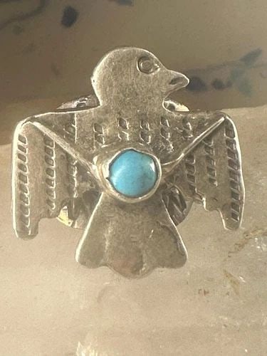 PHOENIX RING TURQUOISE BAND NAVAJO SIZE 5.75 STERLING SILVER WOMEN: PHOENIX RING TURQUOISE BAND NAVAJO SIZE 5.75 STERLING SILVER WOMEN Phoenix ring Turquoise band Navajo size 5.75 sterling silver women Size 5.75 Weight 5.7g Length 3/4" Width 13/16" Thinnest part od ba