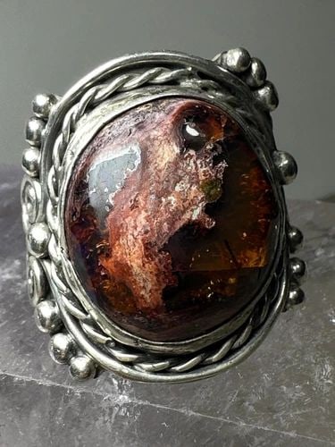 BOULDER OPAL RING BOHO SIZE 5.25 STERLING SILVER WOMEN: BOULDER OPAL RING BOHO SIZE 5.25 STERLING SILVER WOMEN Cantera Boulder Opal ring boho size 5.25 sterling silver women Size 5.25 Between a size 5.25 and a size 5.50 Weight. 12.2g Length 1" Width. 7/8" 