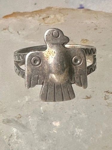 PHOENIX RING THUNDERBIRD NAVAJO BAND SIZE 7.5 STERLING SILVER WOMEN GIRLS PINKY: PHOENIX RING THUNDERBIRD NAVAJO BAND SIZE 7.5 STERLING SILVER WOMEN GIRLS PINKY Phoenix ring Navajo Thunderbird band size 7.5 sterling silver women girls pinky Size 7.5 Between a size 7.50 and a size 