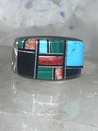 TURQUOISE RING SIZE 5.75 BEAR BAND STERLING SILVER WOMEN: Turquoise inlaid ring size 5.75 spirit bear band spiny oyster onyx malachite sterling silver women Size 5.75 Weight 8.1g Width. 7/16" Thinnest part of band 1/4"