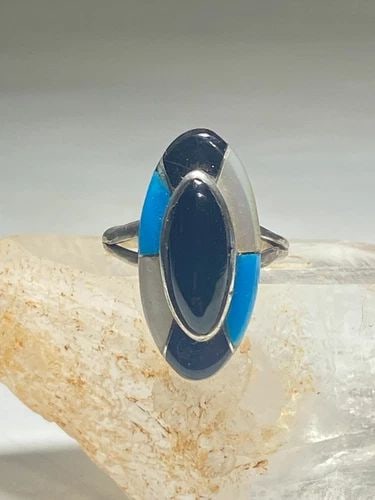 LONG TURQUOISE RING NAVAJO ONYX MOP STERLING SILVER WOMEN: LONG TURQUOISE RING NAVAJO ONYX MOP STERLING SILVER WOMEN Long Turquoise ring Navajo Onyx MOP sterling silver women signed FM Imperfection on the silver edge of the setting Stones are not impacted by 