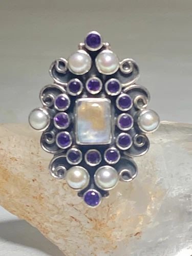 LONG MOONSTONE RING AMETHYST PEARL STERLING SILVER WOMEN GIRLS: LONG MOONSTONE RING AMETHYST PEARL STERLING SILVER WOMEN GIRLS Long Moonstone Ring amethyst pearl sterling silver women girls Size 5.75 Weight 10.8g Length 1 3/8" Width. 1" Thinnest part of band 5/32"