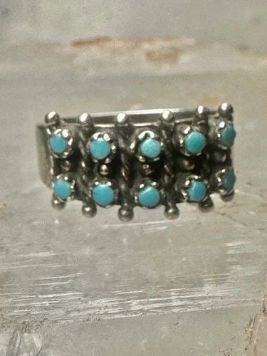 ZUNI RING SIZE 7.5 TURQUOISE PETITE POINT BAND STERLING SILVER WOMEN: ZUNI RING SIZE 7.5 TURQUOISE PETITE POINT BAND STERLING SILVER WOMEN Zuni ring size 7.5 Turquoise Petite point band sterling silver women Size 7.5 Weight 4.4g Width 3/8" Band in the back 3/16"