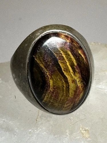 TIGER EYE RING SIZE 7.75 SOUTHWESTERN STERLING SILVER WOMEN MEN: TIGER EYE RING SIZE 7.75 SOUTHWESTERN STERLING SILVER WOMEN MEN Tiger Eye ring southwestern sterling silver women men Size 7.75 Between a size 7.75 and a size 8 Weight 11.9g Length 3/4" Width. 1/2" Th