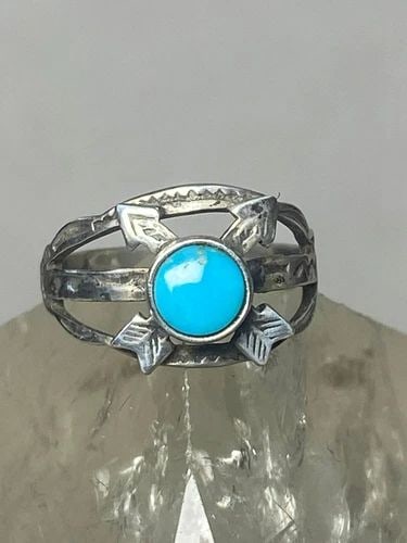ARROWS RING TURQUOISE BAND NAVAJO SOUTHWEST STERLING SILVER WOMEN: ARROWS RING TURQUOISE BAND NAVAJO SOUTHWEST STERLING SILVER WOMEN Arrows ring Turquoise band southwest sterling silver women Size 1 Weight. 1.3g Length. 1" Widest part 3/8" Thinnest part 3/32"