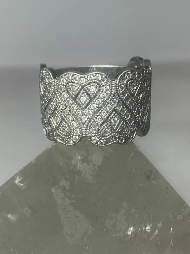 HEART RING LOVE VALENTINE BAND COCKTAIL STERLING SILVER WOMEN: HEART RING LOVE VALENTINE BAND COCKTAIL STERLING SILVER WOMEN Heart ring love Valentine band cocktail sterling silver women Size 9.25 Weight 9.2g Widest part 1/2" Thinnest part 3/8"