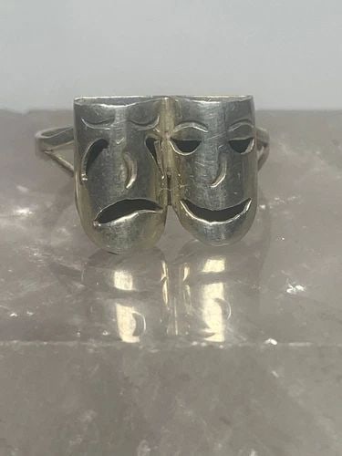 TRAGIC COMIC RING SIZE 5.50 STERLING SILVER TRAGEDY COMEDY THEATRICAL BAND THEAT: TRAGIC COMIC RING SIZE 5.50 STERLING SILVER TRAGEDY COMEDY THEATRICAL BAND THEAT Tragic comic ring sterling silver tragedy comedy theatrical band theater women girls Size 5.75 Between a size 5.75 and 