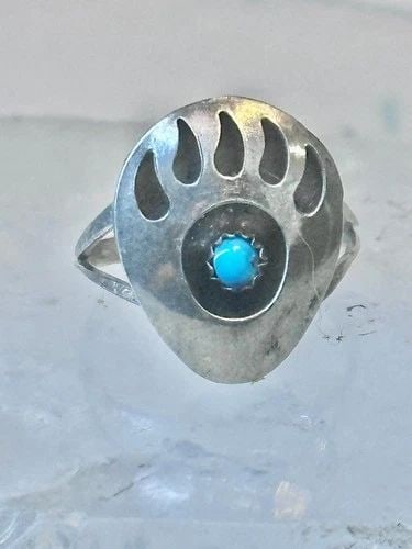 NAVAJO BEAR RING SIZE 4.50 STERLING SILVER PINKY WOMEN GIRLS: NAVAJO BEAR RING SIZE 4.50 STERLING SILVER PINKY WOMEN GIRLS Navajo bear ring footprint size 4.50 sterling silver pinky women girls Size 4.50 Weight 1.5g Length. 5/8" Width 1/2" Thinnest part of band 