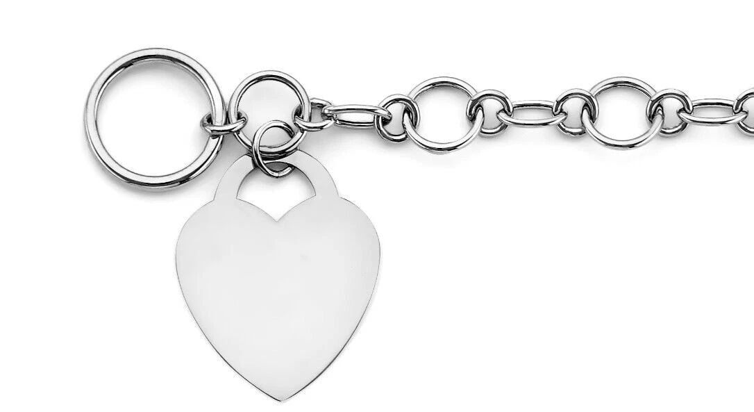 NEW 14K WHITE GOLD HOLLOW BRACELET WITH HEART PENDANT: NEW 14K WHITE GOLD HOLLOW BRACELET WITH HEART PENDANT HOLLOW BRACELET WITH HEART PENDANT NEW 14K WHITE GOLD LENGTH - 7.5in Apx WEIGHT - 5.5g