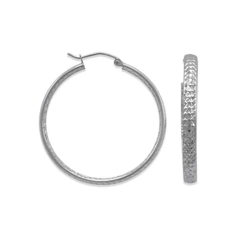NEW 14K WHITE GOLD 3.8MM FULL D/C TUBE HOOP EARRINGS: NEW 14K WHITE GOLD 3.8MM FULL D/C TUBE HOOP EARRINGS 3.8MM FULL D/C TUBE HOOP EARRINGS NEW 14K WHITE GOLD Width: Approx. 3.8mm Apx WEIGHT: 1.6g