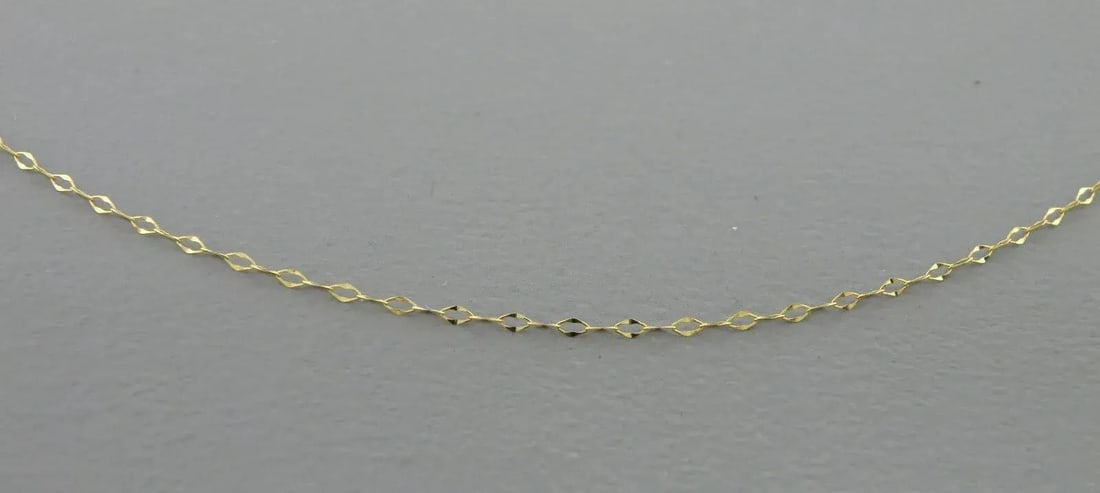 NEW 14K YELLOW GOLD CABLE CHAIN, 20" NECKLACE MADE IN ITALY: NEW 14K YELLOW GOLD 20" CHAIN Necklace measures 20" Long x 0.8mm Wide 14K Yellow gold chain New Stamped 14KT ITALY Total weight apx 0.5 grams