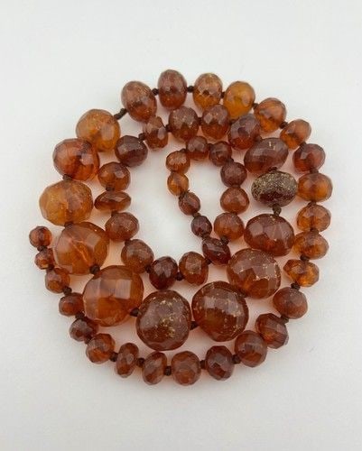 ANTIQUE NATURAL COGNAC BALTIC AMBER FACETED GRADUATED BEAD NECKLACE 31" -101.3G: ANTIQUE NATURAL COGNAC BALTIC AMBER FACETED GRADUATED BEAD NECKLACE 31" -101.3G ANTIQUE NATURAL COGNAC BALTIC AMBER FACETED GRADUATED BEAD NECKLACE 31" -101.3g Size: 31" Long Tip To Tip - No Clasp Wei