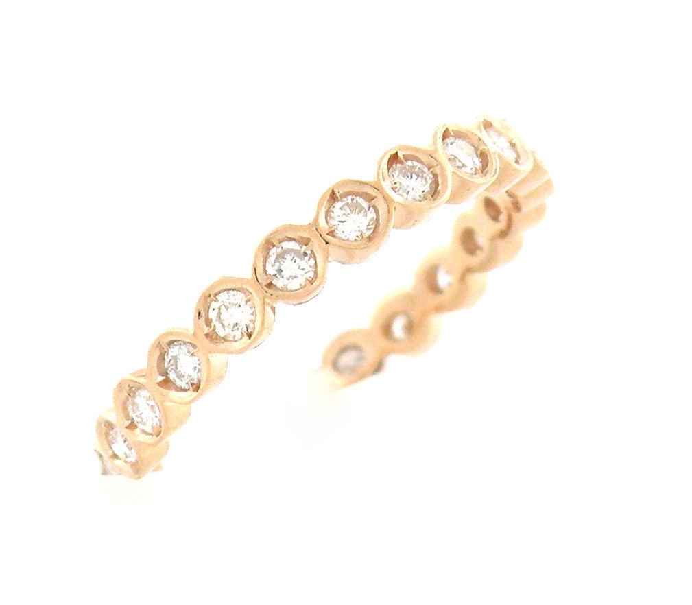 NEW 14K ROSE GOLD FULL ETERNITY DIAMOND WEDDING BAND: Diamond Full Eternity RingConditionNewMaterial14K Rose goldStonesDiamonds H SI1Stone Weight0.60ct tw apxSize5.5 - 2.5mm WideWeight1.6g
