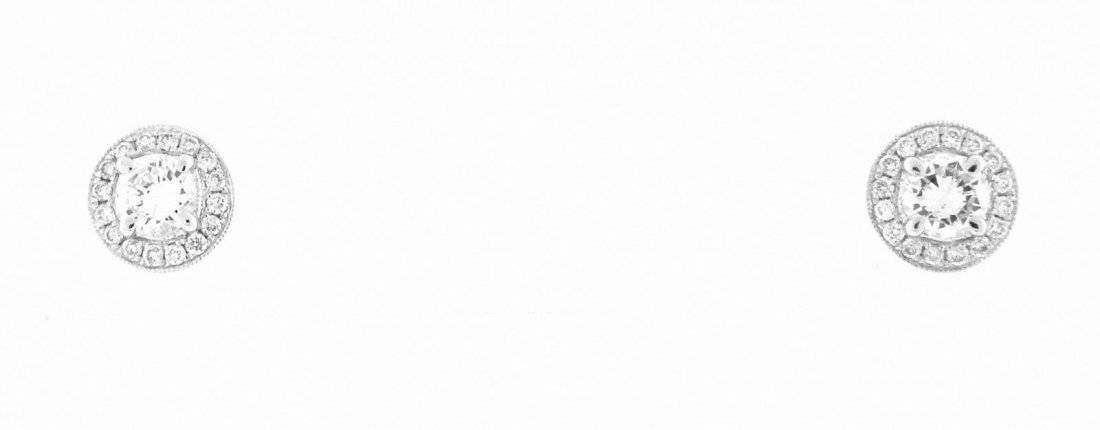 NEW 14K WHITE GOLD DIAMOND STUDS EARRINGS 0.90ct G SI1: Ladies EarringsConditionNewMaterial14k White goldStonesNatural Diamonds G SI1Stone Weight0.90ct tw - Center apx 0.35ctWeight1.5g